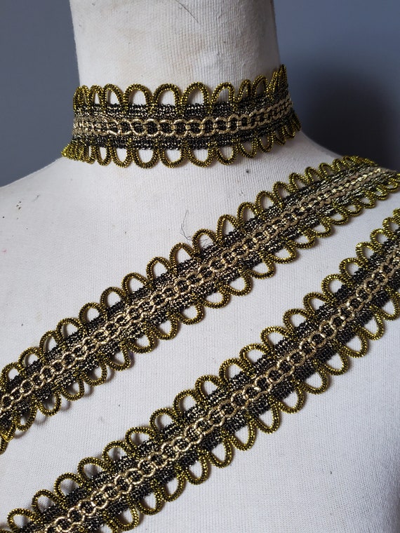 Cute  trim gold and black  color  1  yard listing 1 inch wide