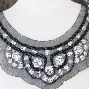 Cute embroidered  and beaded  applique  with  sequins black color