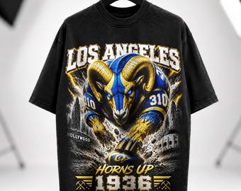 Camiseta vintage com estampa de futebol americano de Los Angeles, moletom com capuz e gola redonda azul e dourada estilo Ram Warrior, peça de streetwear unissex oversized e de tecido pesado.
