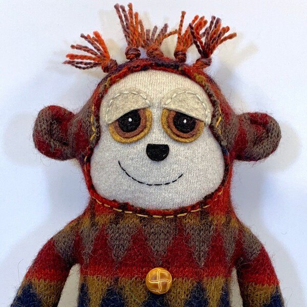 Maxwell Monkey, made from a colorful upcycled wool sweater