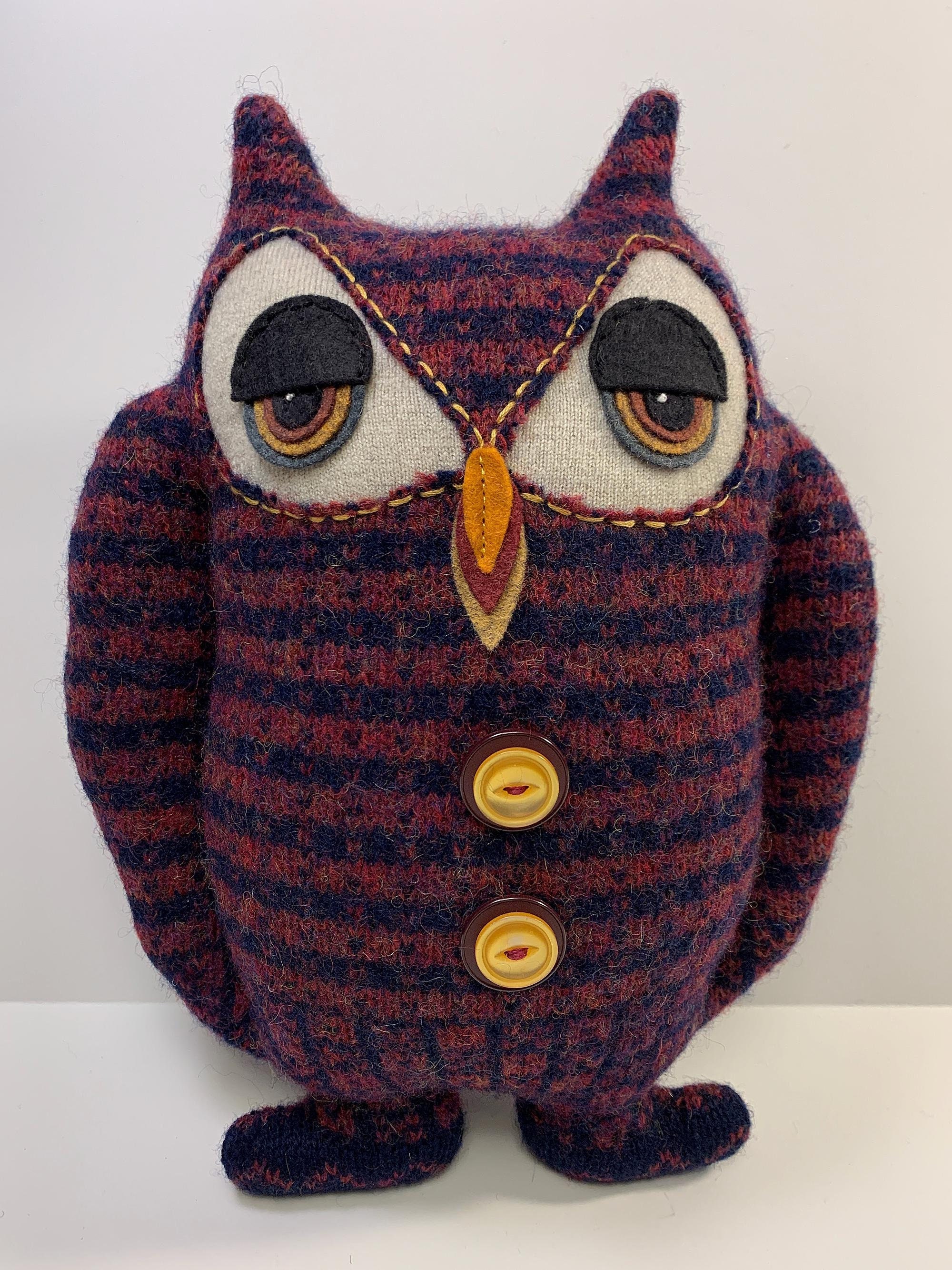 Orvil Owl, made from a burgundy and dark blue upcycled wool sweater