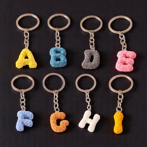 Floral Initial Keychain: Silver Zinc Alloy Letter Bag Charm