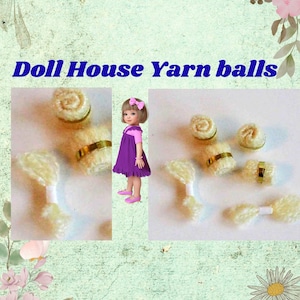 May include: The image shows several miniature dollhouse yarn balls. The yarn balls are cream-colored with a gold band around the center. The text "Doll House Yarn balls" is displayed in blue. A doll is also in the image.