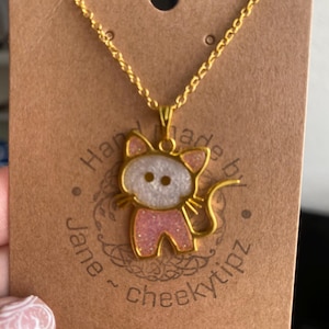 Cat necklace.