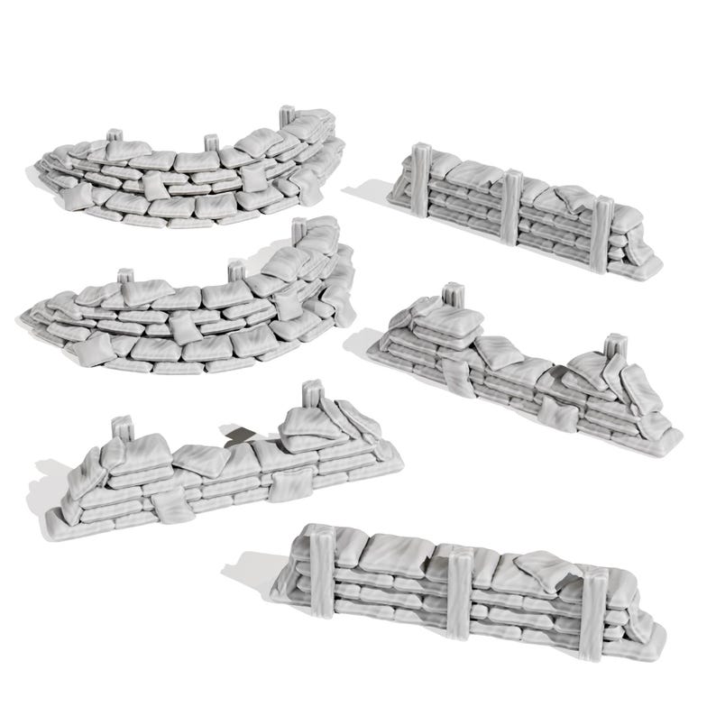 May include: A collection of miniature gray sandbag and stone wall barricades. The set includes curved and straight sections, ideal for tabletop gaming or model building. The pieces are made of a light gray material.