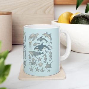 Ocean Life Ceramic Mug: Dolphin, Turtle, Sea Creature Design