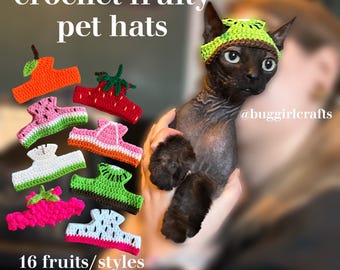 May include: A Sphynx cat wearing a green and brown crochet fruit hat. The image displays various colorful crochet pet hats in the shape of fruits, including an orange, strawberry, and watermelon. Text reads "crochet fruity pet hats" and "16 fruits/styles available!"