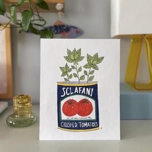 May include: A hand-drawn illustration of a can of crushed tomatoes with a blue label that says "SCLAFANI" and "CRUSHED TOMATOES".  Two red tomatoes and three green basil plants are growing out of the can.