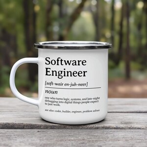 Enamel mug with definition of "Software Engineer" in black text.