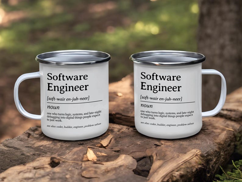 Two white enamel mugs with "Software Engineer" definition text.