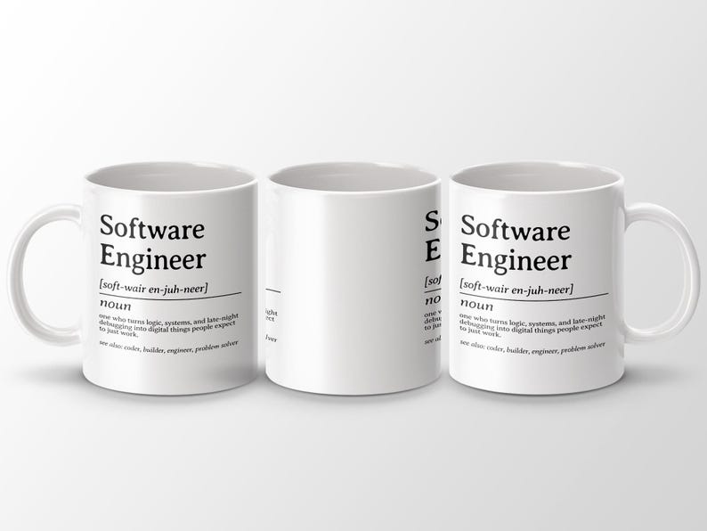 Three white mugs with "Software Engineer" definition printed in black text.