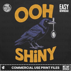 Può includere: Design digitale con un corvo viola che tiene un cucchiaio nel becco, con le parole "OOH SHINY" in lettere arancioni. Il design è su sfondo nero e include il testo "COMMERCIAL USE PRINT FILES".
