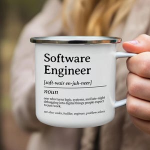 Enamel mug with "Software Engineer" definition text.