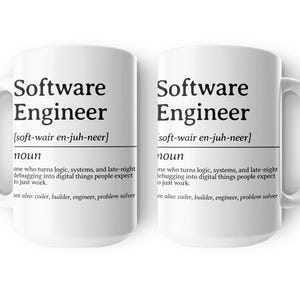 Two mugs with "Software Engineer" definition: one who turns logic into digital things.