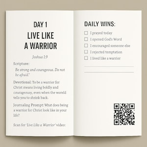 May include: Open journal with the text "DAY 1 LIVE LIKE A WARRIOR" and "DAILY WINS" checklist. The journal includes a scripture from Joshua 1:9 and a journaling prompt. A QR code is visible on the right page.