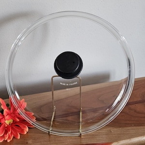 May include: A rustic wooden sign with the text "Welcome to our home" in a handwritten style. The sign features a distressed finish and a simple, inviting design, perfect for a front porch or entryway.