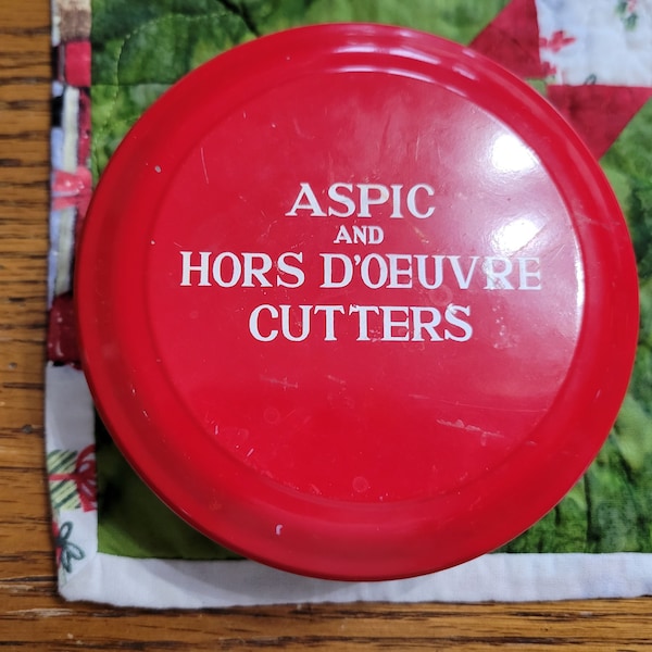 13 Vintage Aspic and Hors D'oeuvre Miniature Cutters in Storage Tin by Tala / Circa 1950's