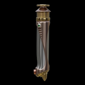 May include: A metallic lightsaber with a silver, bronze, and gold finish. The hilt features a green gem and intricate detailing. The lightsaber is approximately 11 inches long.