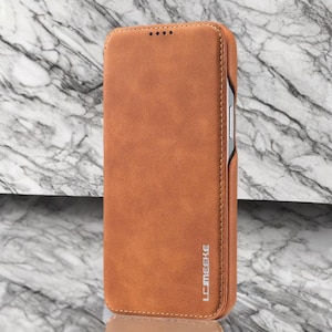 Funda magnética tipo billetera de cuero con tapa para iPhone 16 a 11. Estuche tipo libro delgado con ranuras para tarjetas con cubierta magnética desmontable y compatibilidad con MagSafe.