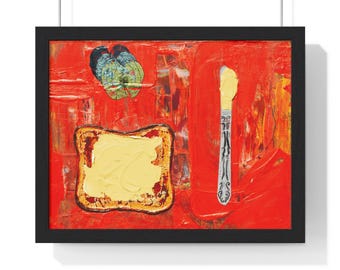 May include: Framed art print featuring a vibrant abstract painting. The artwork depicts a slice of toast with butter, a butter knife, and a green and blue design on a red background. The black frame enhances the colorful composition.