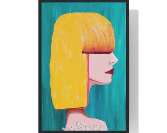 May include: A framed art print featuring a side profile of a woman with yellow hair and red lipstick against a teal background. The woman's skin is pink, and a pink line runs down her neck. The artwork has a modern, pop art style.