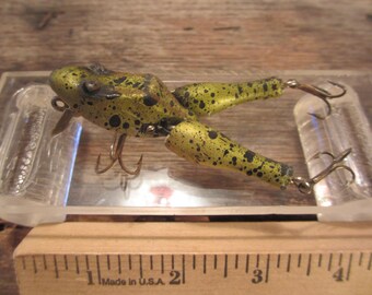 antique fishing lures frogs Vintage Pflueger Fisherman Repainted Conrad Frog Lure For Sale attracting fish from far and wide all the while being Specially Weighted to Cast Like a Bullet and always Land Upright The first frog - Bassmaster