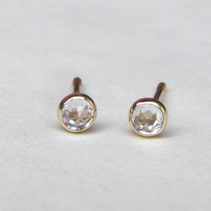 14K Solid gold Stud Earrings 3mm with white topaz stone. image 3