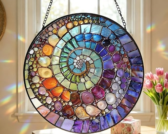 Abstrakt regnbågssnäcka spiral solfångare målat glas kuststrand gåva