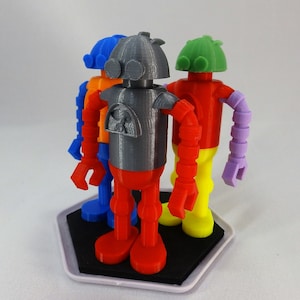 Custom Colors Robot Toy. Personalize this 3D printed sculpture with up to five different colors of your choice.