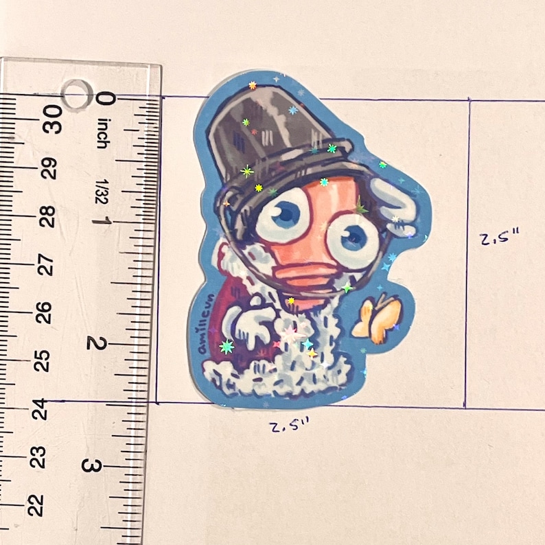 Pode incluir: Um autocolante extravagante com uma personagem de desenho animado com grandes olhos azuis, usando uma cartola e um casaco vermelho. O autocolante tem aproximadamente 6,35 cm de altura e largura, com uma borda azul e detalhes brilhantes.