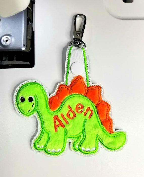 dinosaur luggage tag
