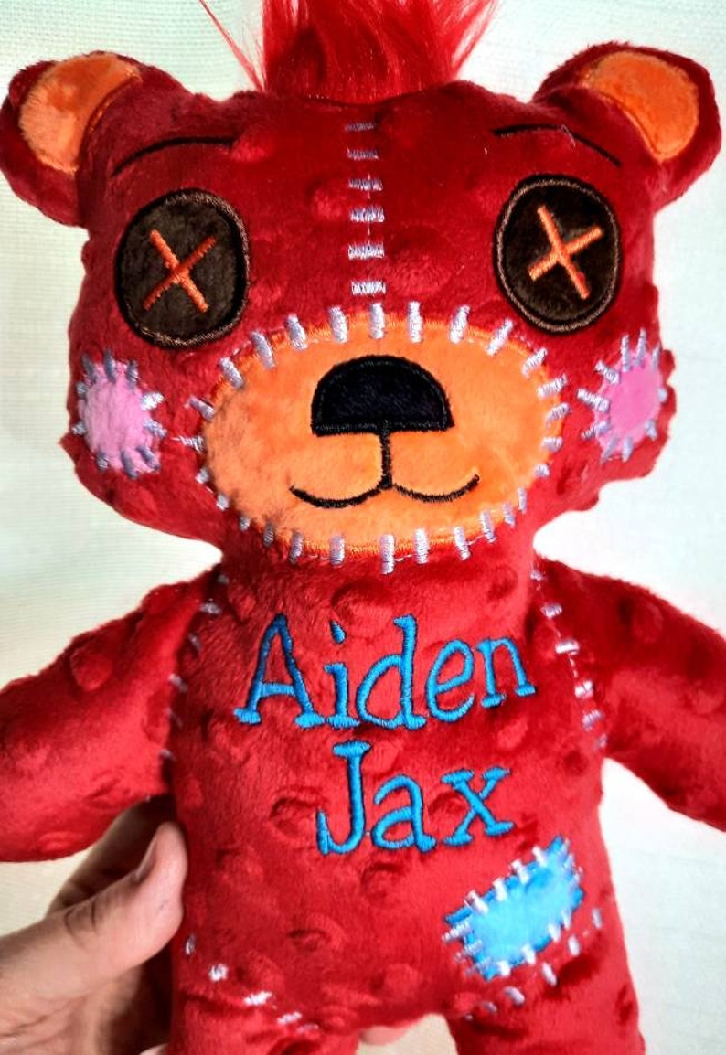 cocomelon red teddy bear