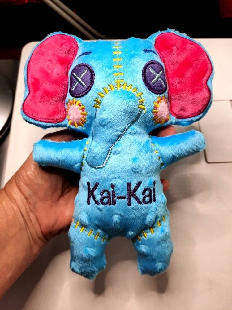 small stuffed blue elephant