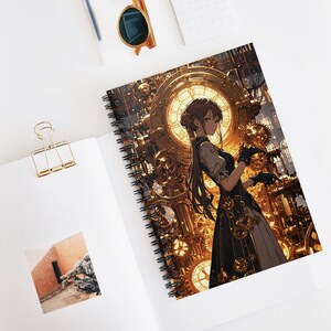 May include: Spiral-bound notebook with a steampunk illustration. The cover shows a woman in a Victorian outfit, set against a backdrop of gears and clockwork. The notebook lies open on a white surface, with a gold paper clip and sunglasses visible.