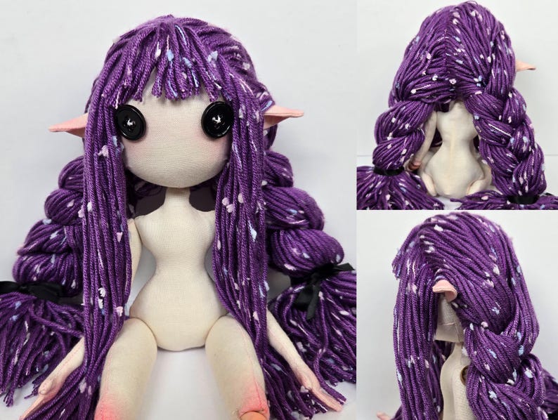 May include: A handmade doll with a fabric body and long, purple yarn hair. The doll has button eyes, pink ears, and is wearing a black bow. The hair is styled in braids and loose strands, with white flecks throughout.