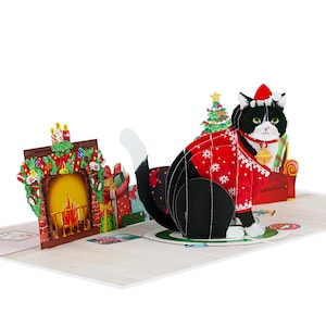 Tarjeta 3D desplegable de gato navideño – Tarjeta de felicitación festiva – Escena de chimenea acogedora hecha a mano