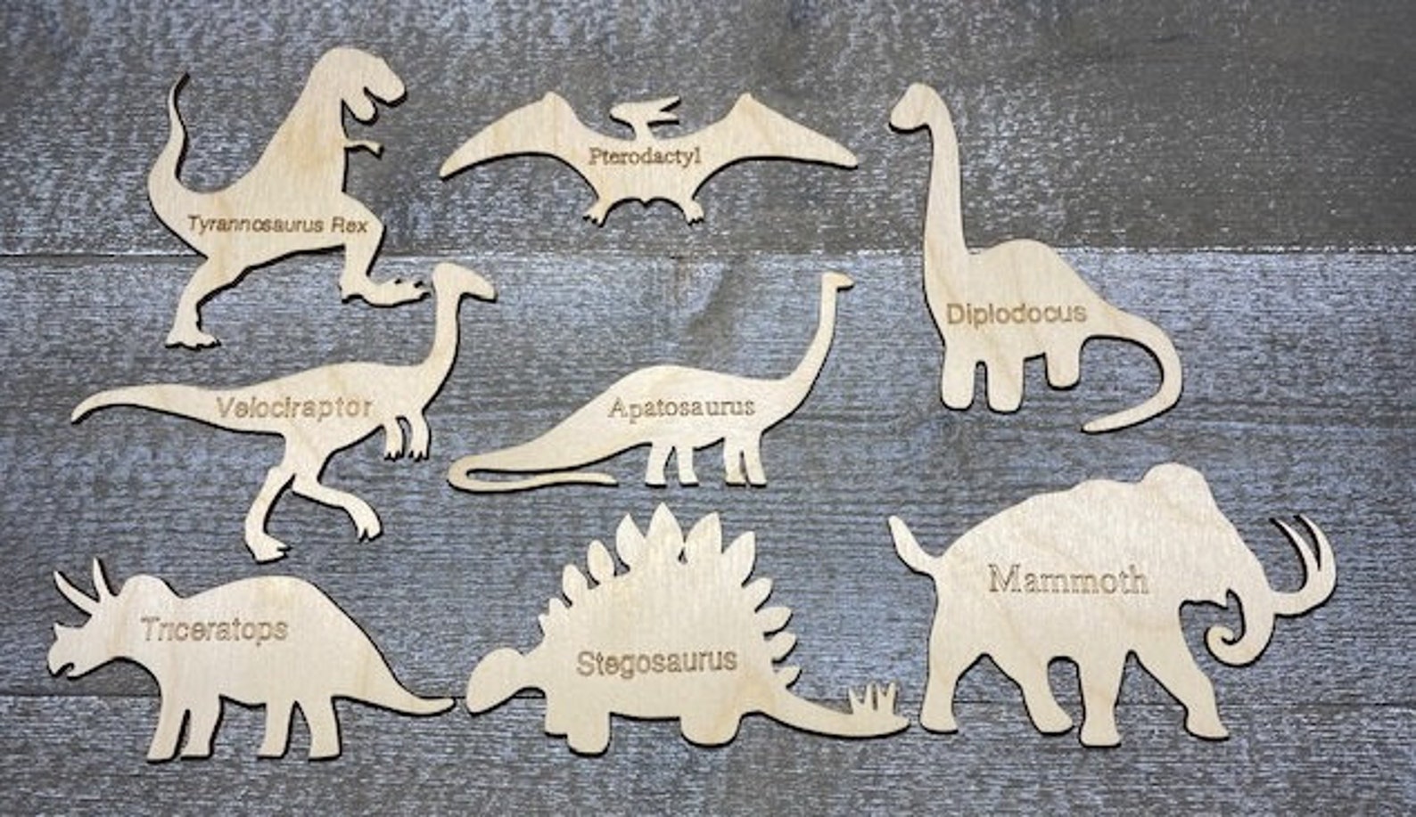 painted wood dinosaur cut outs