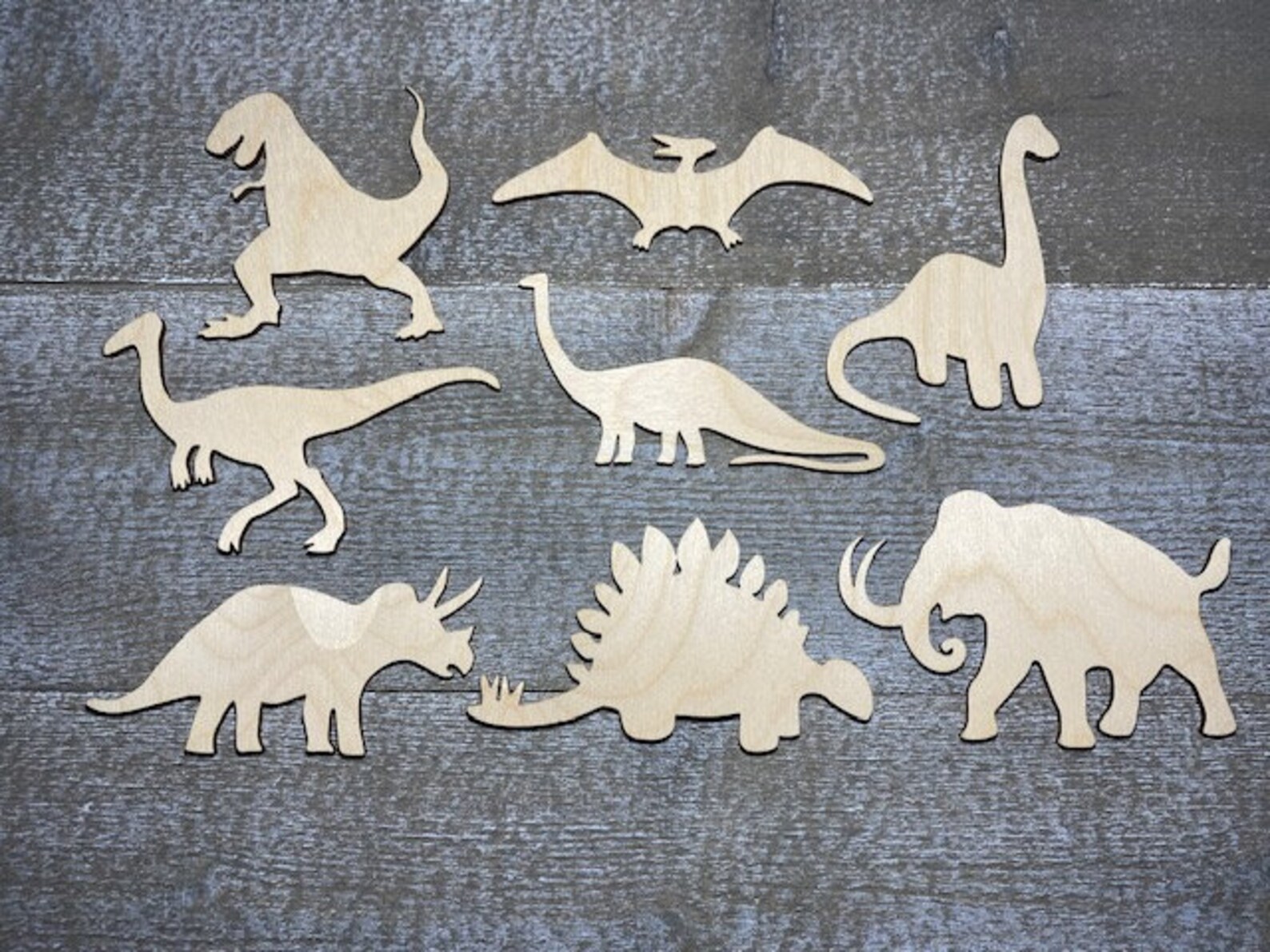 painted wood dinosaur cut outs