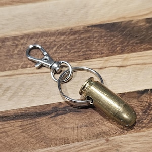 authentic handmade bullet keychain. .45 ACP non live round
