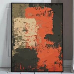 May include: Abstract art print in a black frame. The artwork features a textured design with blocks of orange, beige, olive green, and black. The painting is displayed against a white door and floor.