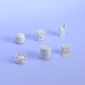 May include: A collection of white miniature objects, including a hamburger, a safe, a milk carton, a barrel, a crown, and a laptop computer. The objects are arranged on a light blue surface.