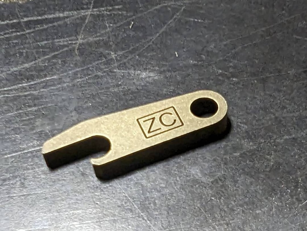 The Hooker Bottle Opener