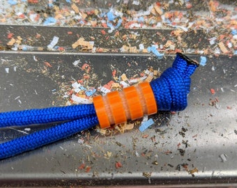 Medium Orange G10 Lanyard Bead With Three Grooves and a Free Paracord Lanyard