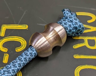 Medium Curvy Brass Lanyard Bead and a Free Paracord Lanyard