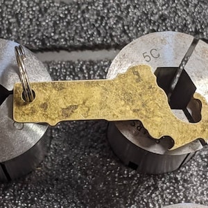 Brass State of Massachusetts key chain with Patina