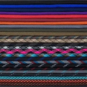 May include: A collection of 25 different colors and patterns of paracord, a type of strong nylon cord often used for crafting and outdoor activities.