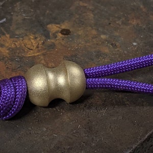Medium Curvy Blasted Brass Lanyard Bead and a Free Paracord Lanyard