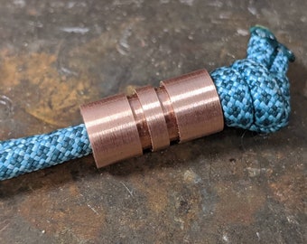 Wide Edge Medium Copper Bead With 2 Grooves and a Free Paracord Lanyard