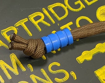 Medium Blue G10 Lanyard Bead With Three Grooves and a Free Paracord Lanyard