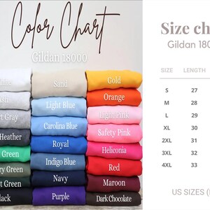 May include: Color chart and size chart for Gildan 18000 apparel. The color chart displays folded apparel in various colors, including white, black, and orange. The size chart shows US sizes, with lengths and widths in inches.